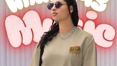 a woman in a tan Reggae cassette t - shirt and leopard print pants