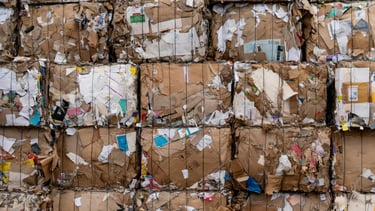 Stacked bundles of waste like paper or textiles