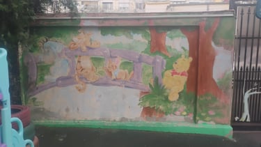 Pictură exterioară gard Winnie de Pluș.