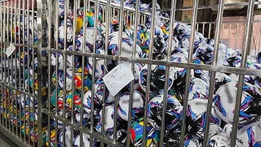 Standardized mass production of inflatable soccer balls for wholesale sports equipment orders at ballsvendor.com.