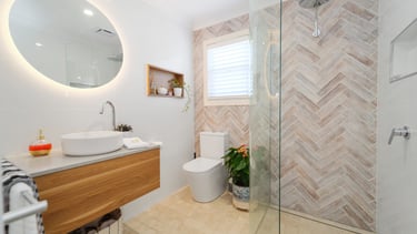 A clean, modern ensuite offering comfort and privacy for guests.