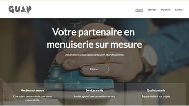 a person holding a cell phone in front of a screen