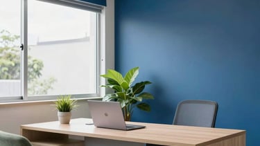 A clean and modern commercial space in South American Brazil, featuring a professional office interior with deep blue and soft white walls. The scene shows a tidy desk with a laptop and a green plant, conveying reliability and trustworthiness in a retail management context. Natural daylight coming through a large window, soft sage green accents on the furniture.