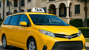 Yellow taxi driving on Southern California highways for city-to-city and long-distance trips.
