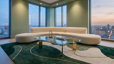 Premium hand-tufted contemporary geometric area rug with fluid green and gold patterns