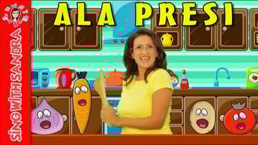 a woman in a yellow shirt is holding a carrot