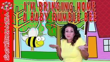 a woman in a yellow shirt and a bee