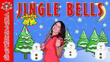 a woman in a red shirt, snowman and a bell