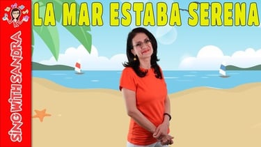 a woman in a red shirt and white pants on a beach