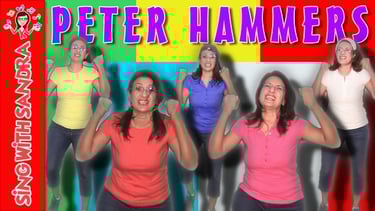 a group of people standing in front of a colorful background