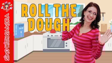 a woman in a striped shirt in a kitchen