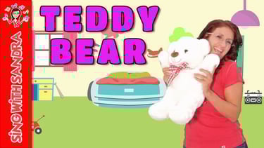 a woman holding a teddy bear