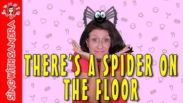 a woman with a spider on the top of her head