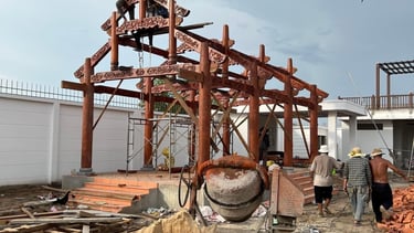 a construction worker is working on a building