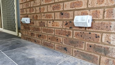 a close up of two outdoor powerpoints