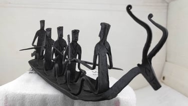 "Handmade Bastar tribal iron boat showing 5 figures – right side angle for decor display-Export-oriented"