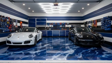 Luxury custom garage with a glossy blue marble-effect epoxy floor,
