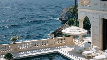 An exclusive, luxury property on the coast, symbolizing a strategic real estate opportunity curated 