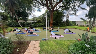 Plank session with Yoga participants to develop endurance and strength