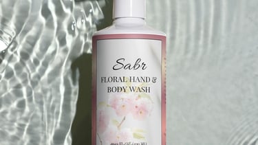 a bottle of soap with a pump on top of it
