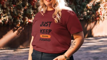 a woman in a red shirt and black pants
