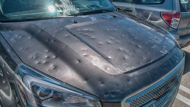 PDR efficiently repairs hail damage by gently pushing dents out without repainting.