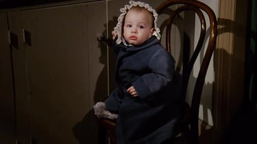 Jennifer (Donati) and Sarah Coleman as Baby Rose Wilder in Little House on the Prairie