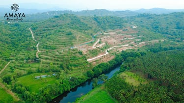 a river with rocks and rocks in the foreground