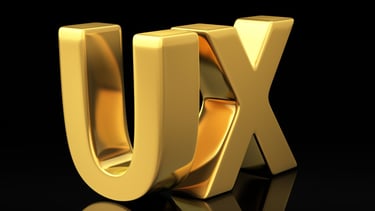 a golden letter ux on a black background