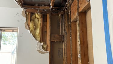 Roof leak damage. Repaired roof and drywall. Water damage.