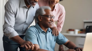 a man and woman looking at a laptop computer