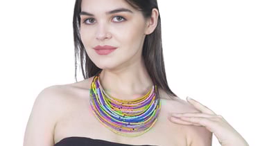 a woman wearing a multicolor handmade bohemian necklace
