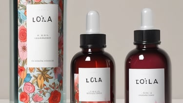 A collection of beauty products arranged aesthetically on a table.