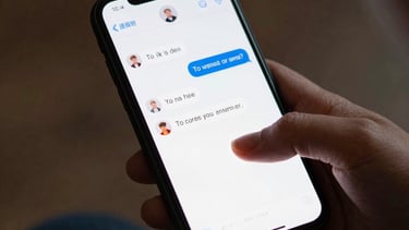 person holding notepad and pen flat lay photography