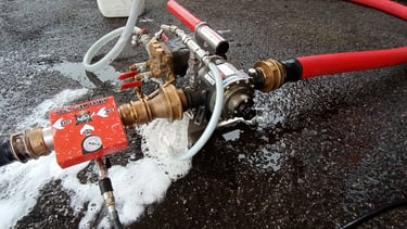 a fire hydrant with a hose attached to a hose with a RAFS