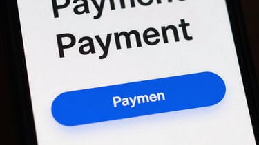 Detail of a minimalist checkout page on a mobile device, showing clean typography and a Royal Blue payment button.