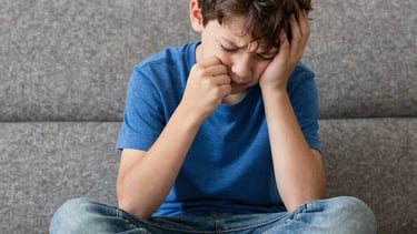 Child having a meltdown because he is tried