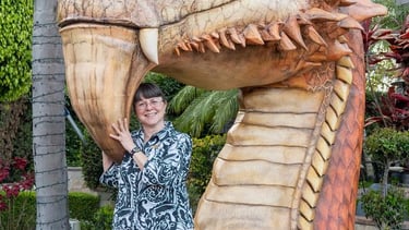 Brenda Posey with dragon sculpture inspired by Ciruelo's art at the Taglyan Complex, Hollywood, CA
