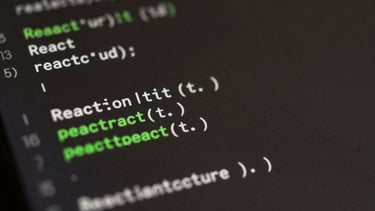 Macro close-up of clean, well-structured React code on a dark screen, soft green syntax highlighting, shallow depth of field, minimalist aesthetic.