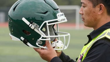 X-ray of a football helmet on white background