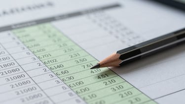 Macro shot of financial audit documents with highlighted figures, a mechanical pencil resting on precise tables, cool diffused lighting.