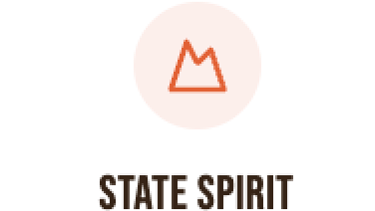 a mountaintop with a mountain in the background