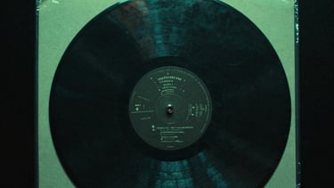 A raw motion graphic still of distorted vinyl record packaging, acid green rim lighting, high-contrast dark 35mm film grain