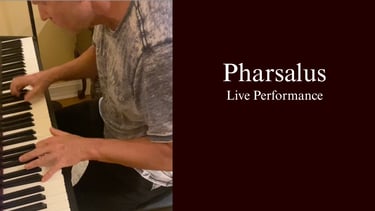 Pharsalus live performance featuring a musician's hands playing a piano keyboard.