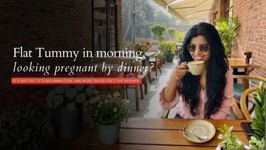 Woman drinking warm herbal tea to relieve evening bloating and improve gut health naturally