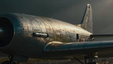 Extreme close-up of weathered rivets on a vintage aircraft fuselage, polished chrome detail of a classic car engine, dramatic low-key lighting, high-contrast shadows, moody atmospheric haze, 35mm anamorphic.
