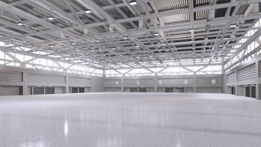 Pintor industrial trabajando en pabellón de polígono en Bizkaia