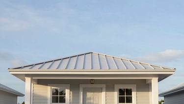 Straight-on architectural elevation of a modern coastal cottage with a clean metal roof under a soft sky-blue Florida sky, bright natural daylight, 35mm