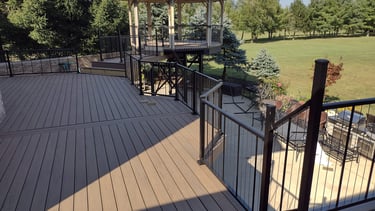Outdoor composite deck by professional deck builder in [Columbus, Ohio]