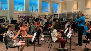 Concert Band Director in rehearsal.